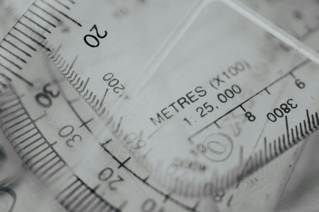 white and black analog gauge